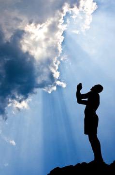 Believer praying to his gods