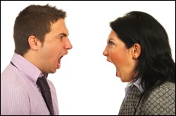 Man and Woman in each others face arguing