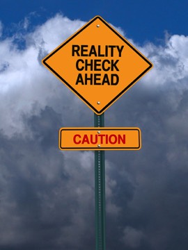 Sign motivating Caution - Reality Check